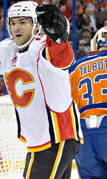 Frolik caps hat trick in last seconds, Flames edge Oilers to snap skid